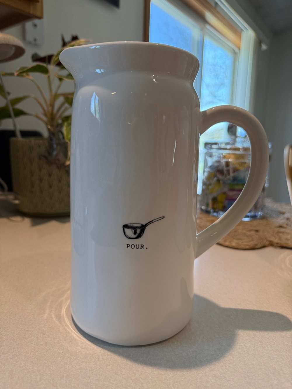 Rae Dunn White Ceramic Pitcher with Black Ladle Graphic